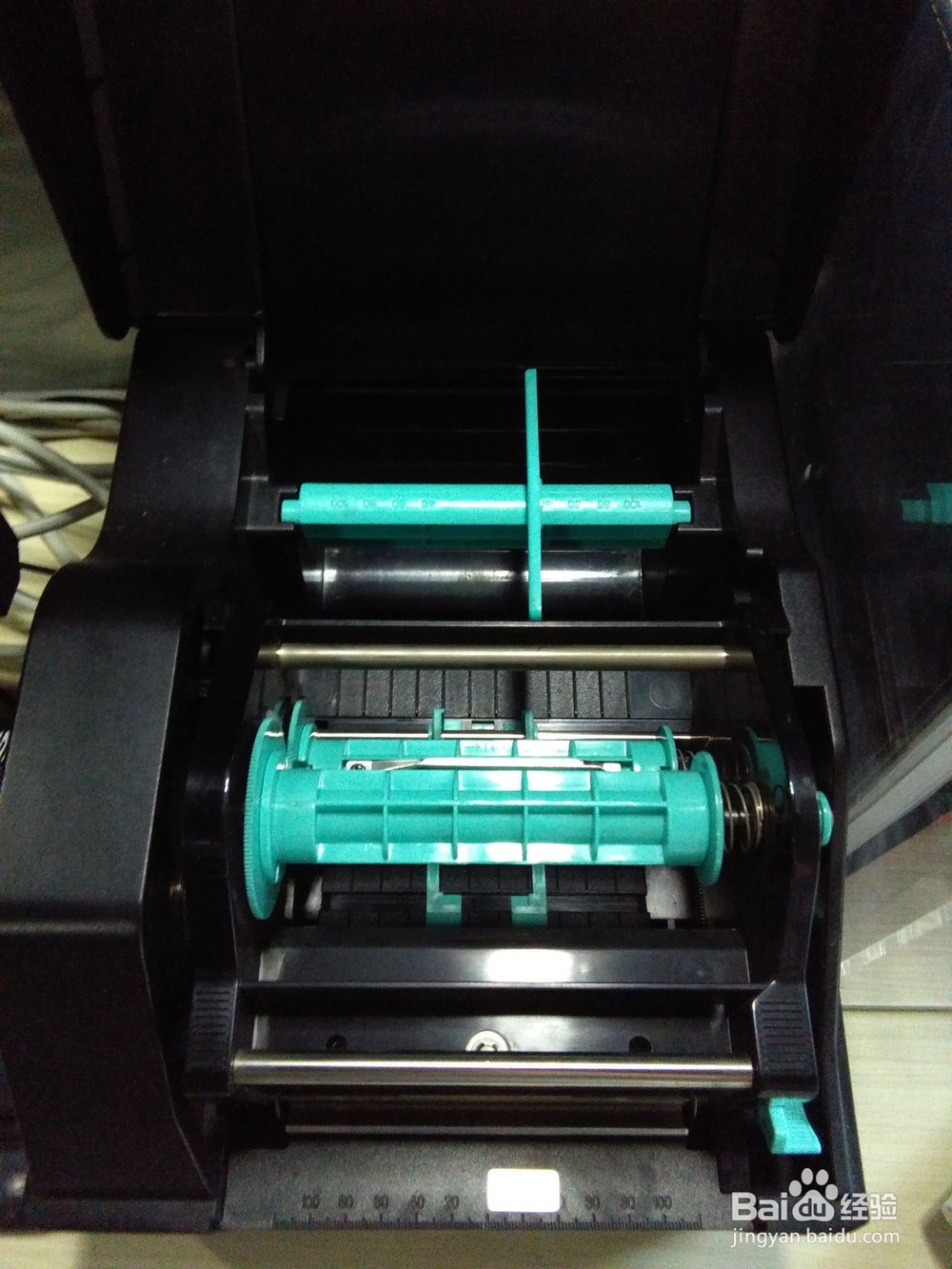 怎样安装博思得的打印机标签纸