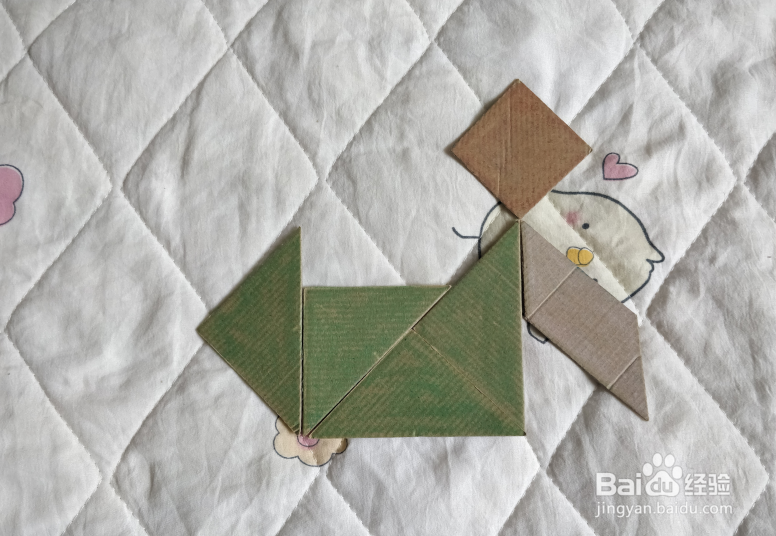 用九巧板怎么拼一个跳街舞的小哥哥呢？