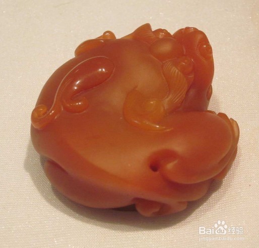 教你如何鉴别和保养黄龙玉?