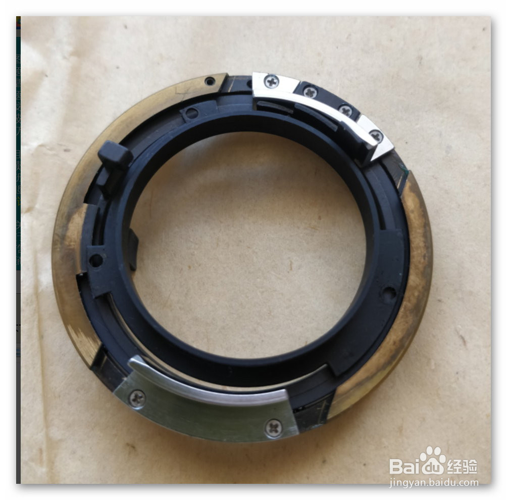 维修R28 调焦环松及对焦紧的问题