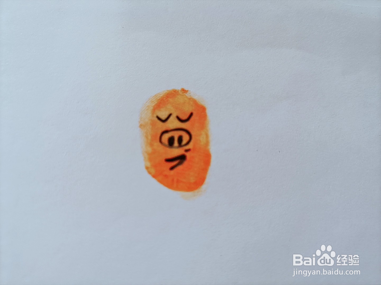 如何用手指印画一只快乐的猪(1)