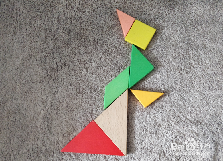 用七巧板怎样拼一个赶路的女士?