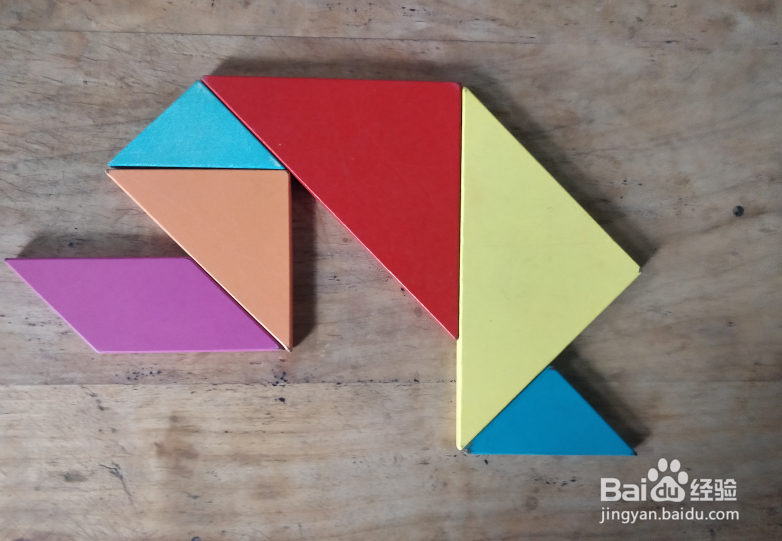 用七巧板怎样拼一个跪着擦地板的保洁员?