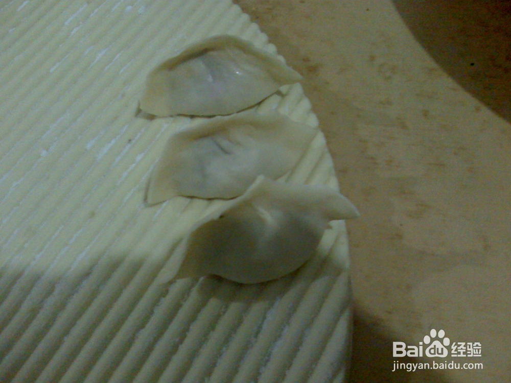 怎样包年三十猪肉酸菜馅饺子--包饺子