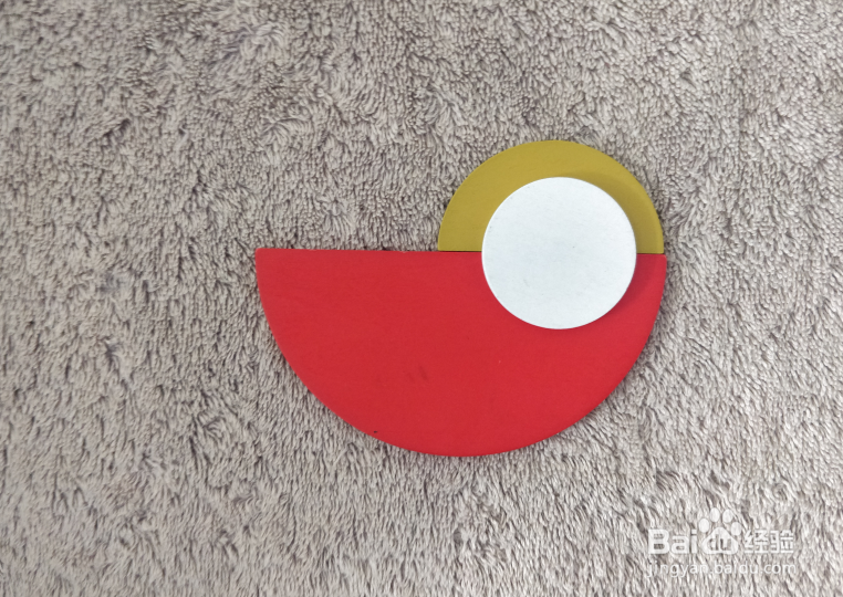 用蒙氏积木怎样拼一只站着扇翅膀的鸟儿？