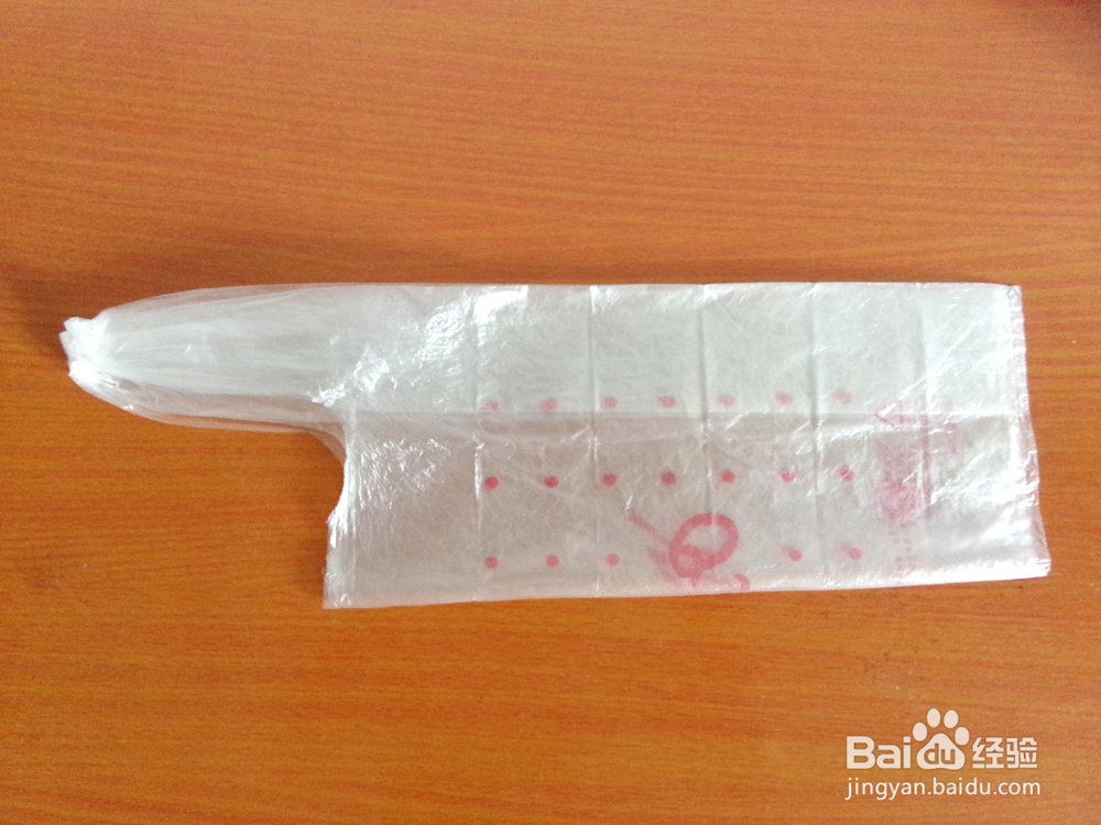 塑料袋怎么收纳之卷筒打结法（用于有耳塑料袋）