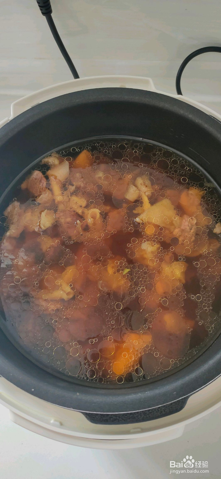 牛腩炖柿子的做法