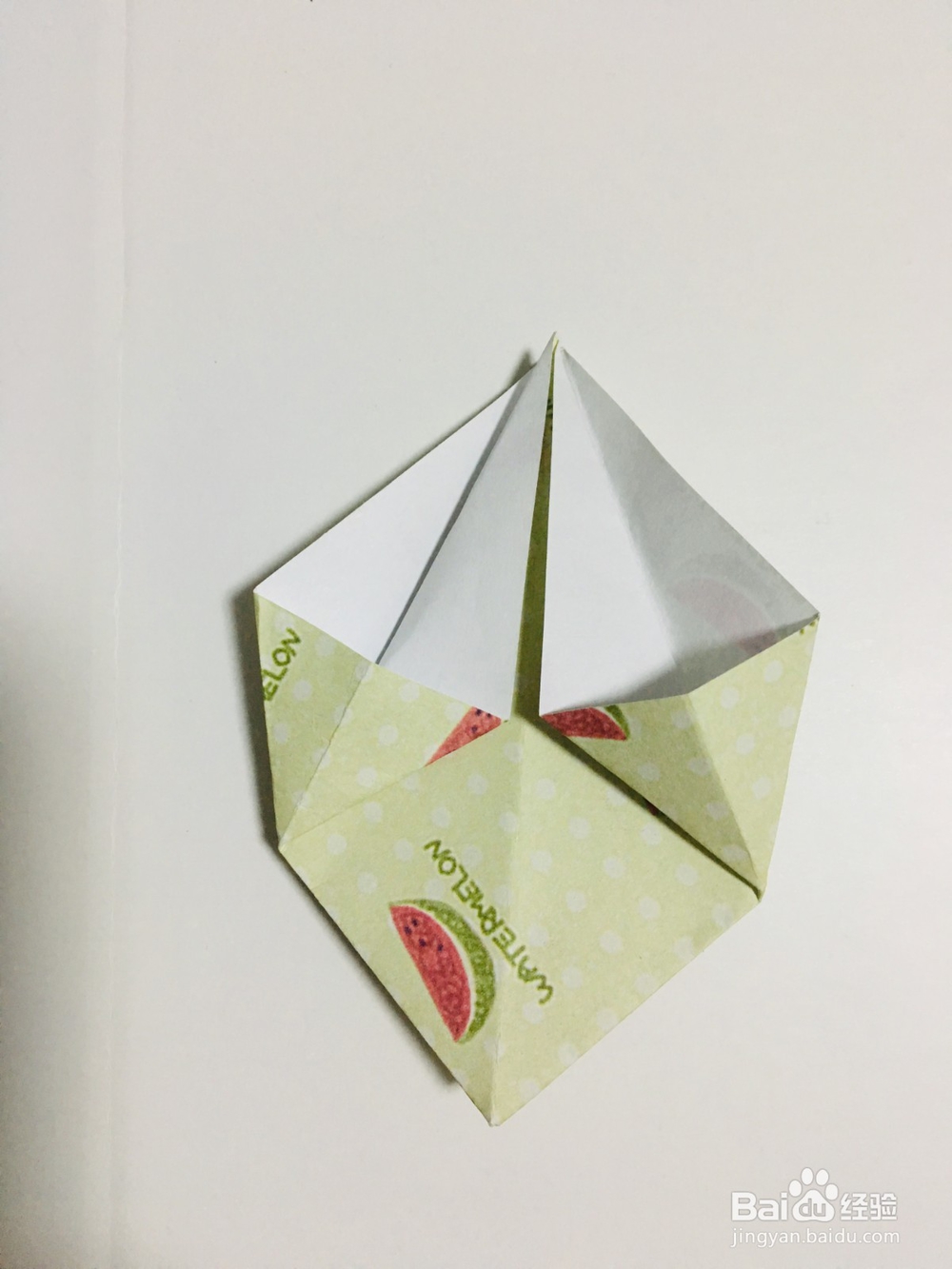 手工折纸：怎样用纸折一个四角星盒子？