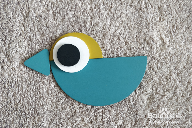 用蒙氏积木怎样拼一只站着拍翅的小鸟？