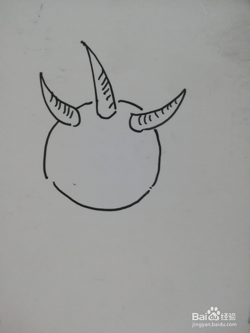 怎么画三只角的怪物简笔画