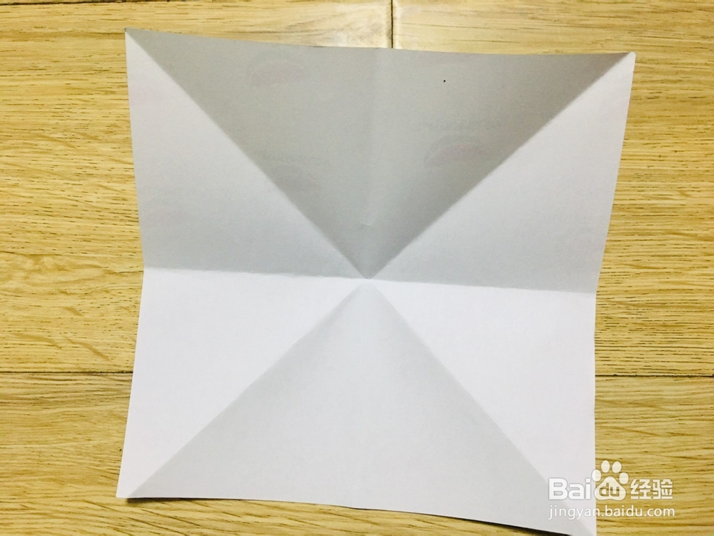 手工折纸：怎样用纸折一个四角星盒子？