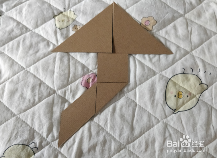 用七巧板怎么拼一只飞在空中的风筝呢？