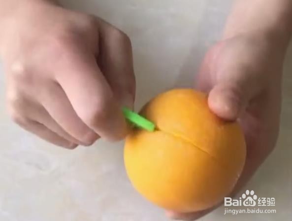 两孔剥橙器怎么用