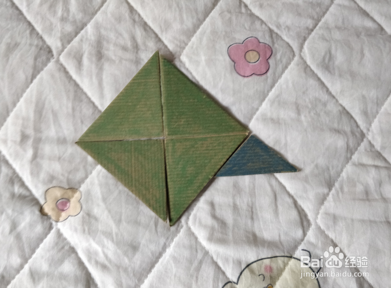 用九巧板怎么拼一个种子瓶呢