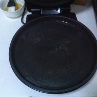 煎五花肉卷金针菇