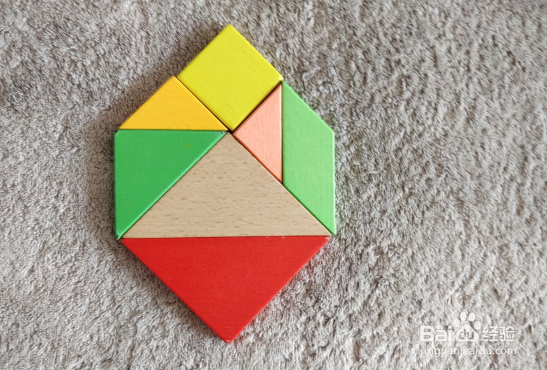 用七巧板怎样拼一个杏核？