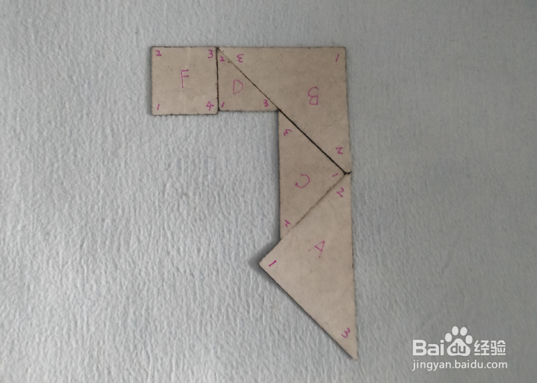 用七巧板怎样拼一只曲棍球杆?