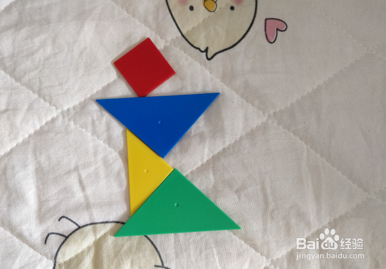 用七巧板智力拼图怎么拼一个大步奔跑的女孩？