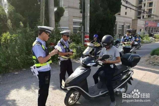 电动车被交警扣了怎么办?