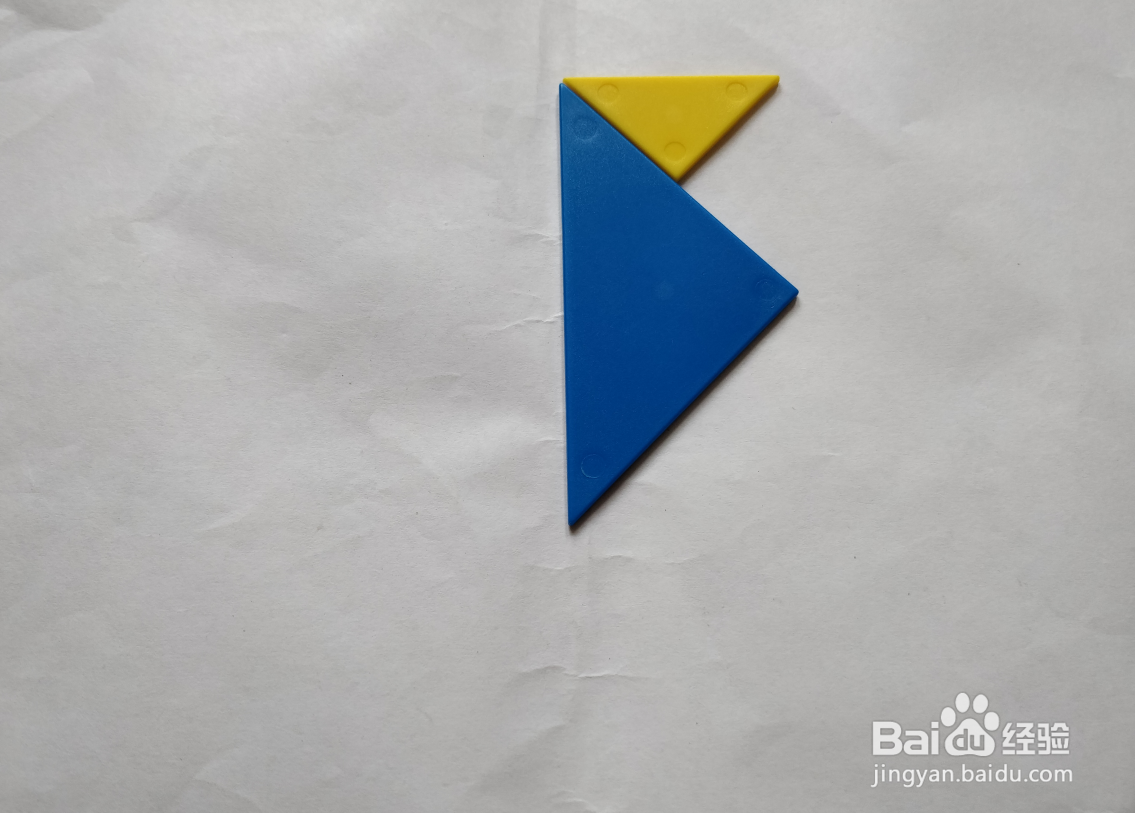 用(蝶式)七巧板怎么拼一只高兴跳跃的狗?