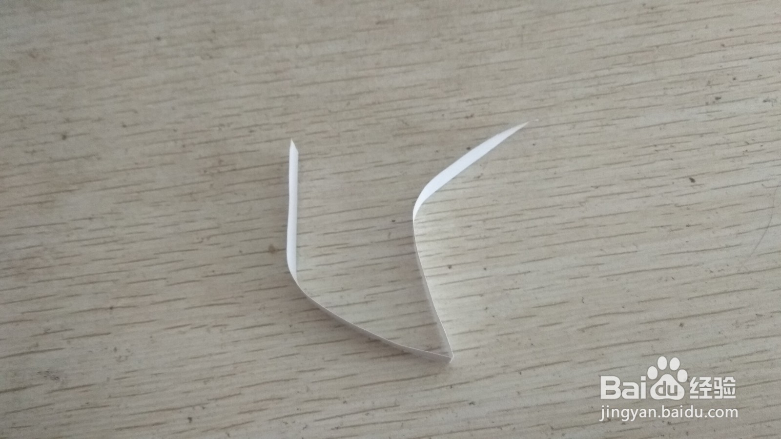 如何用一个长方形纸条做两面放中性笔的支架