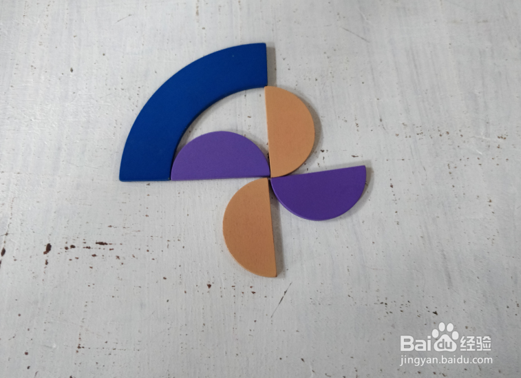 用智力拼板怎样拼一个排风扇?