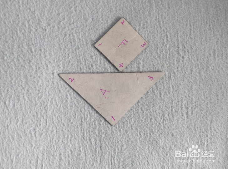 用七巧板怎样拼一个叉开腿活动腰身的人?