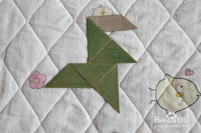 用九巧板怎么拼一个终点冲刺的小哥哥呢？