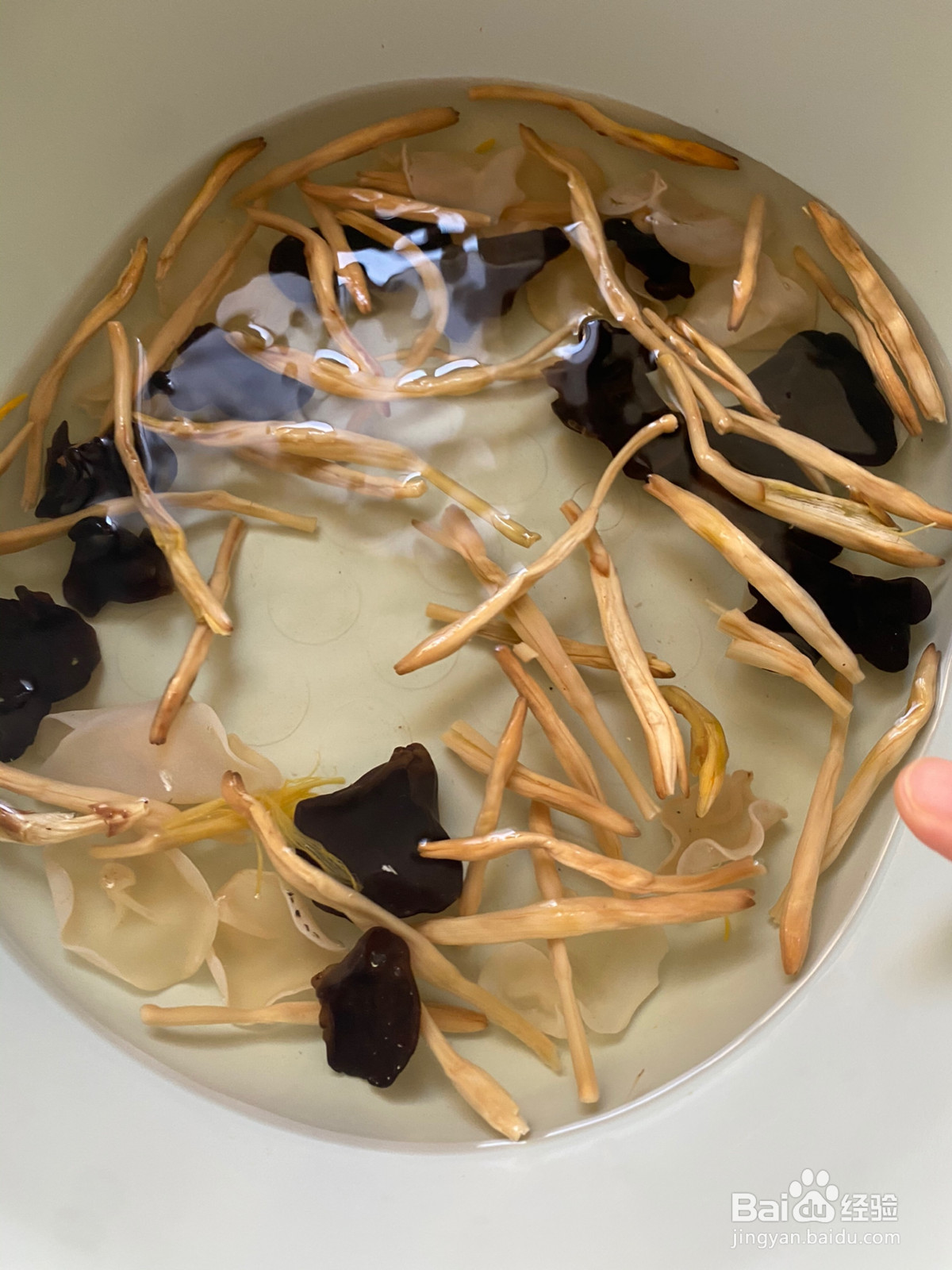 酸汤荤豆花的做法