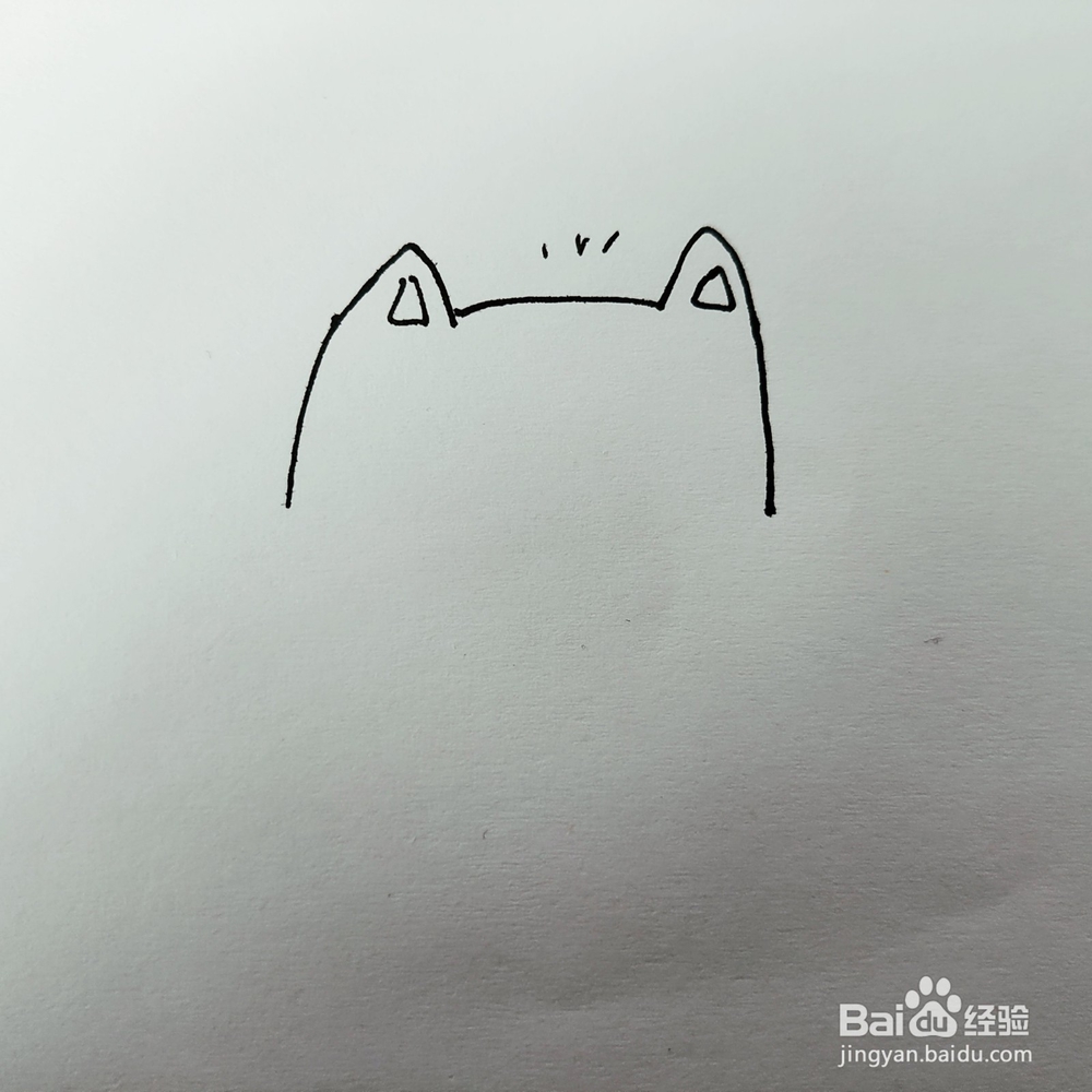 怎么画一只打伞的大脸猫简笔画呢？