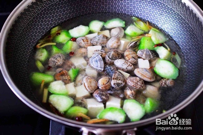 丝瓜花蛤炖豆腐怎么做