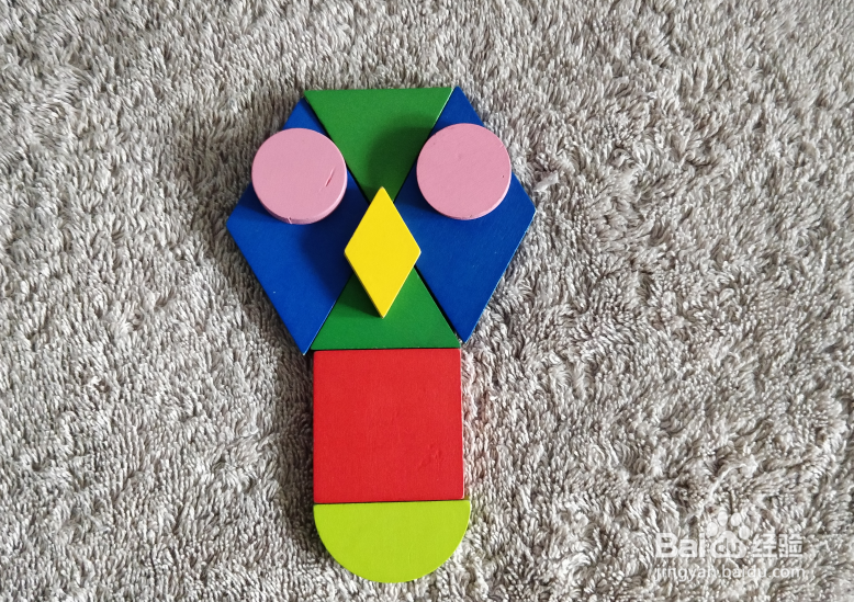 用蒙氏积木怎样拼一只站在树枝上的猫头鹰