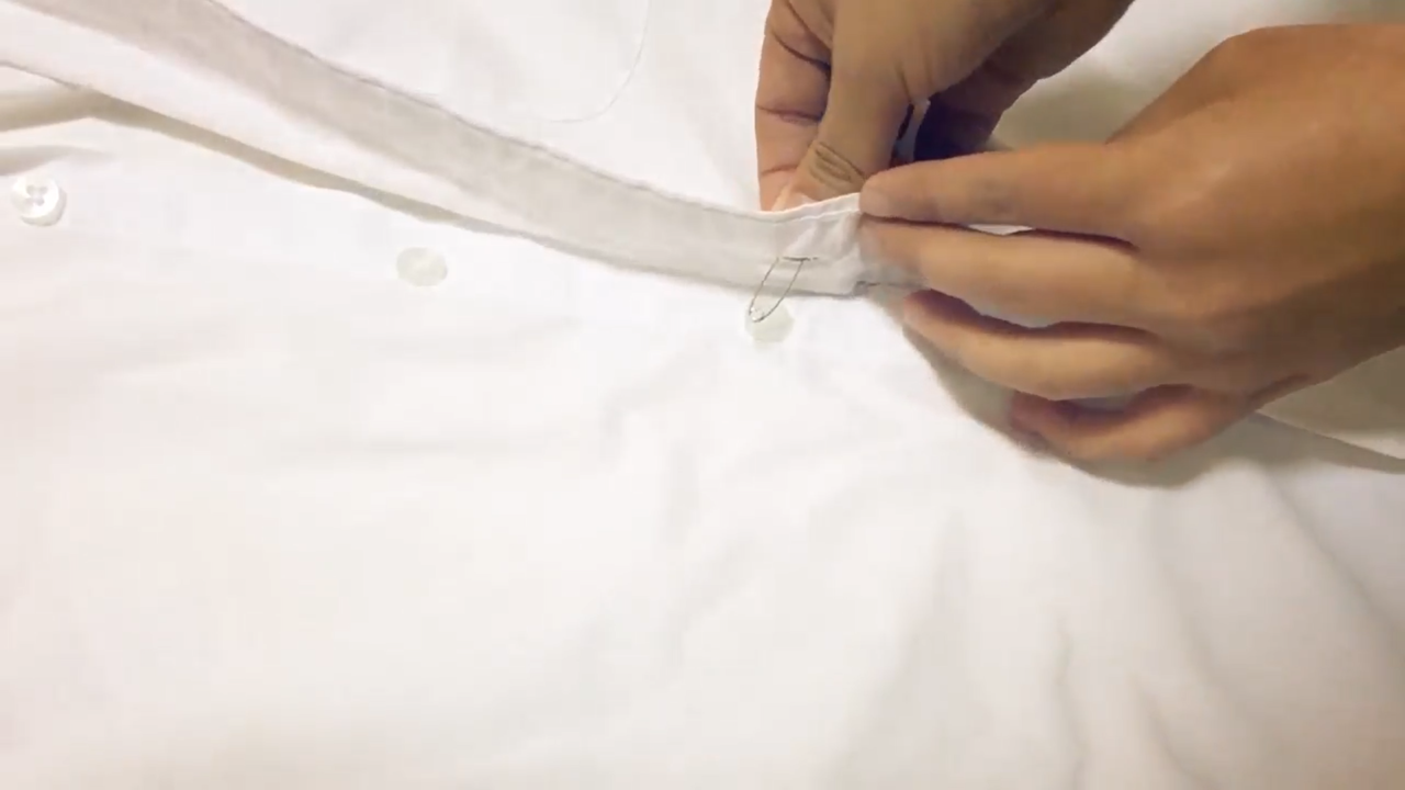 怎样快速的把衣服扣子扣上