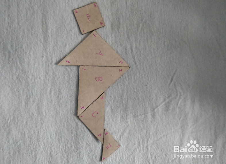 用七巧板怎样拼街上的路人?