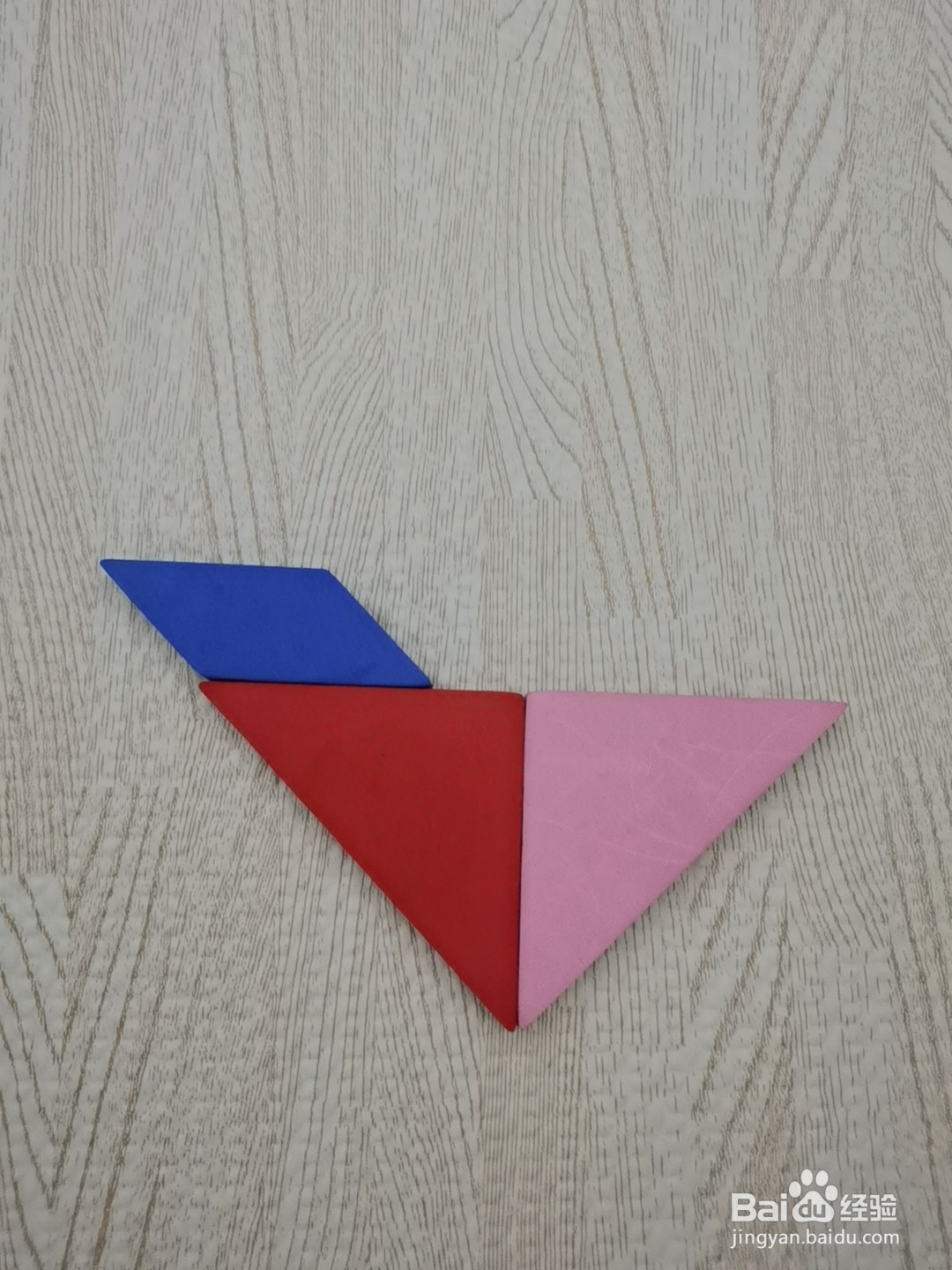 怎么样用七巧板拼一只捉虫子的小鸡仔