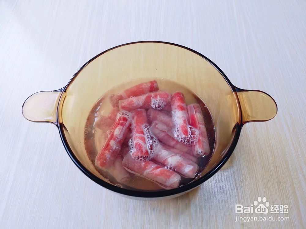 酸汤肥牛金针菇怎么做才好吃？