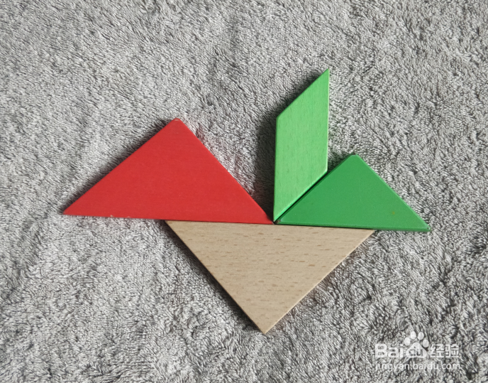 用七巧板怎样拼一个扮乌龟翻倒的幼儿呢?