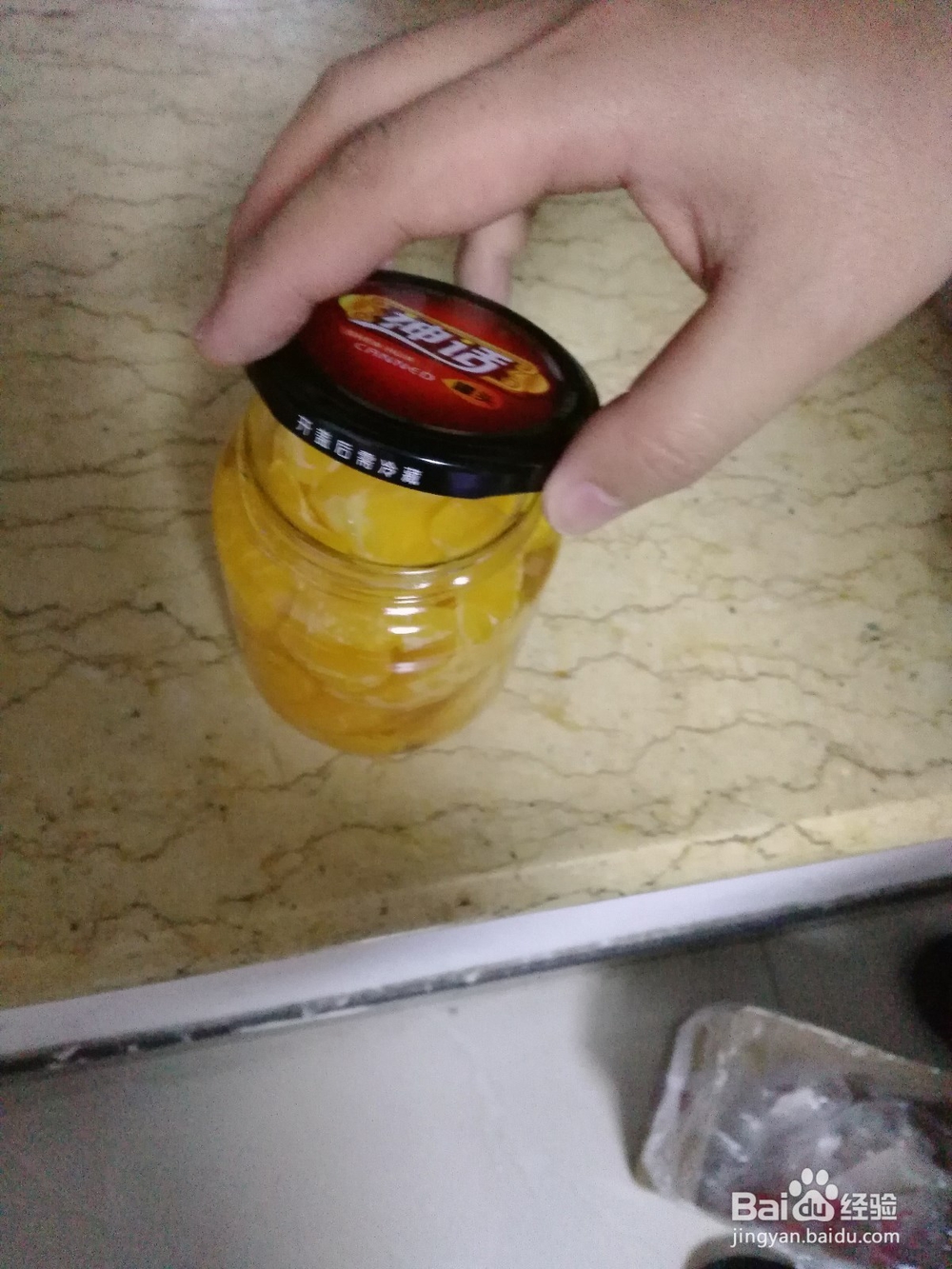 怎样快速打开玻璃罐头？