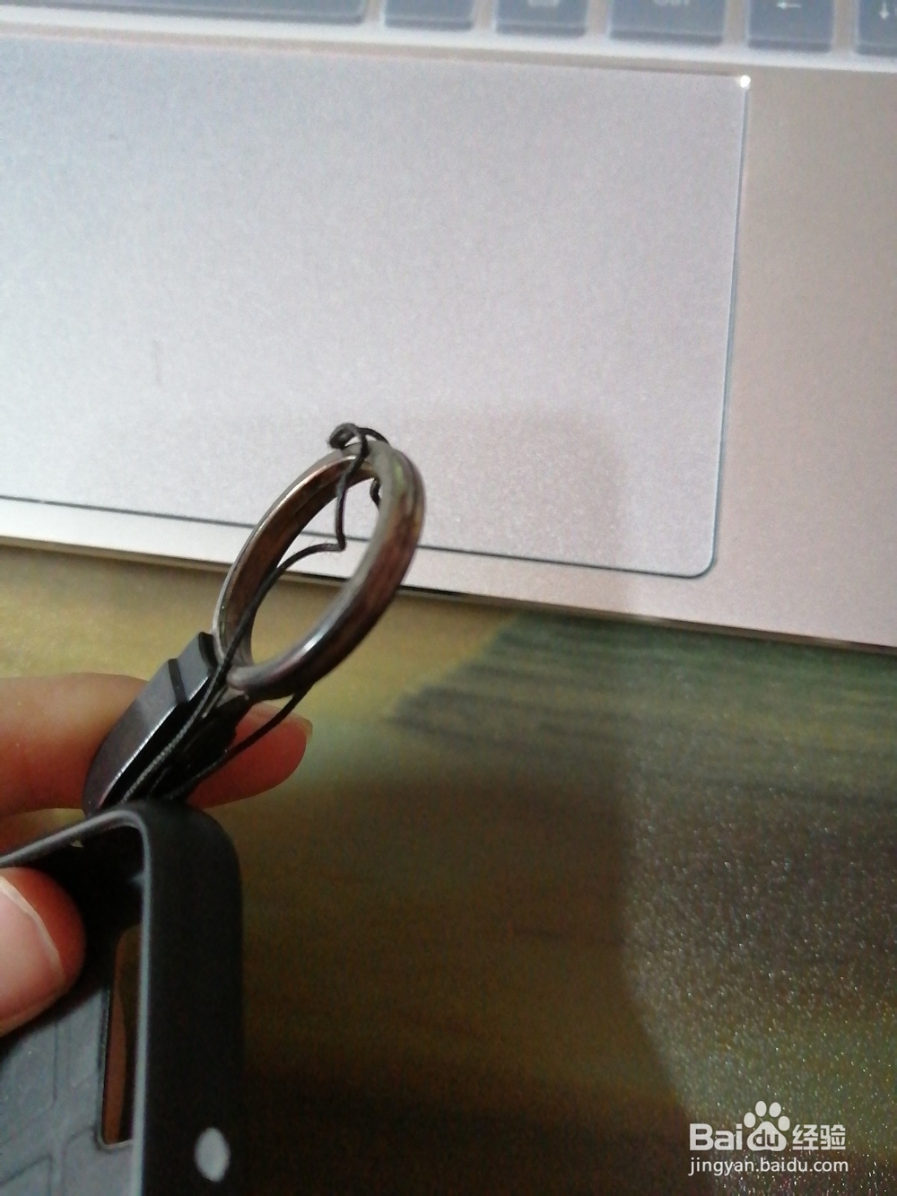 买手机壳送的挂绳怎么用