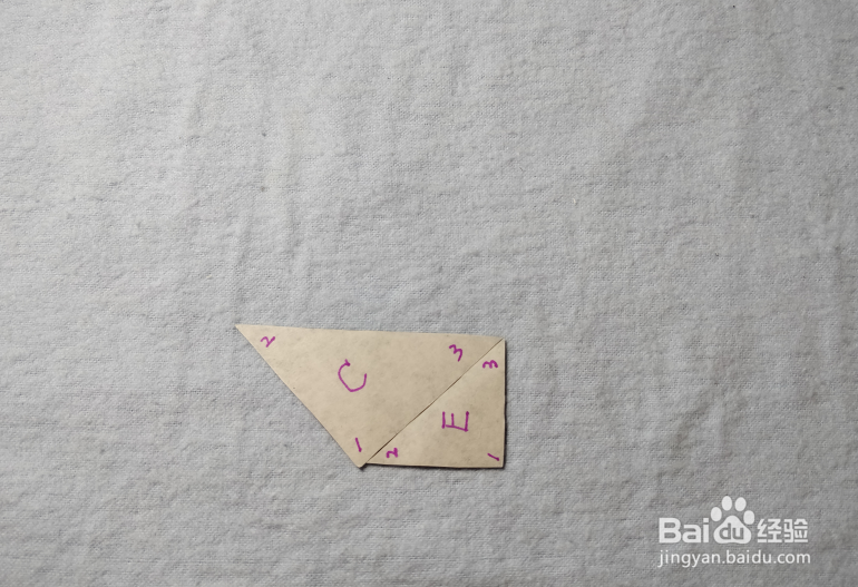 用七巧板怎样拼一个字母C