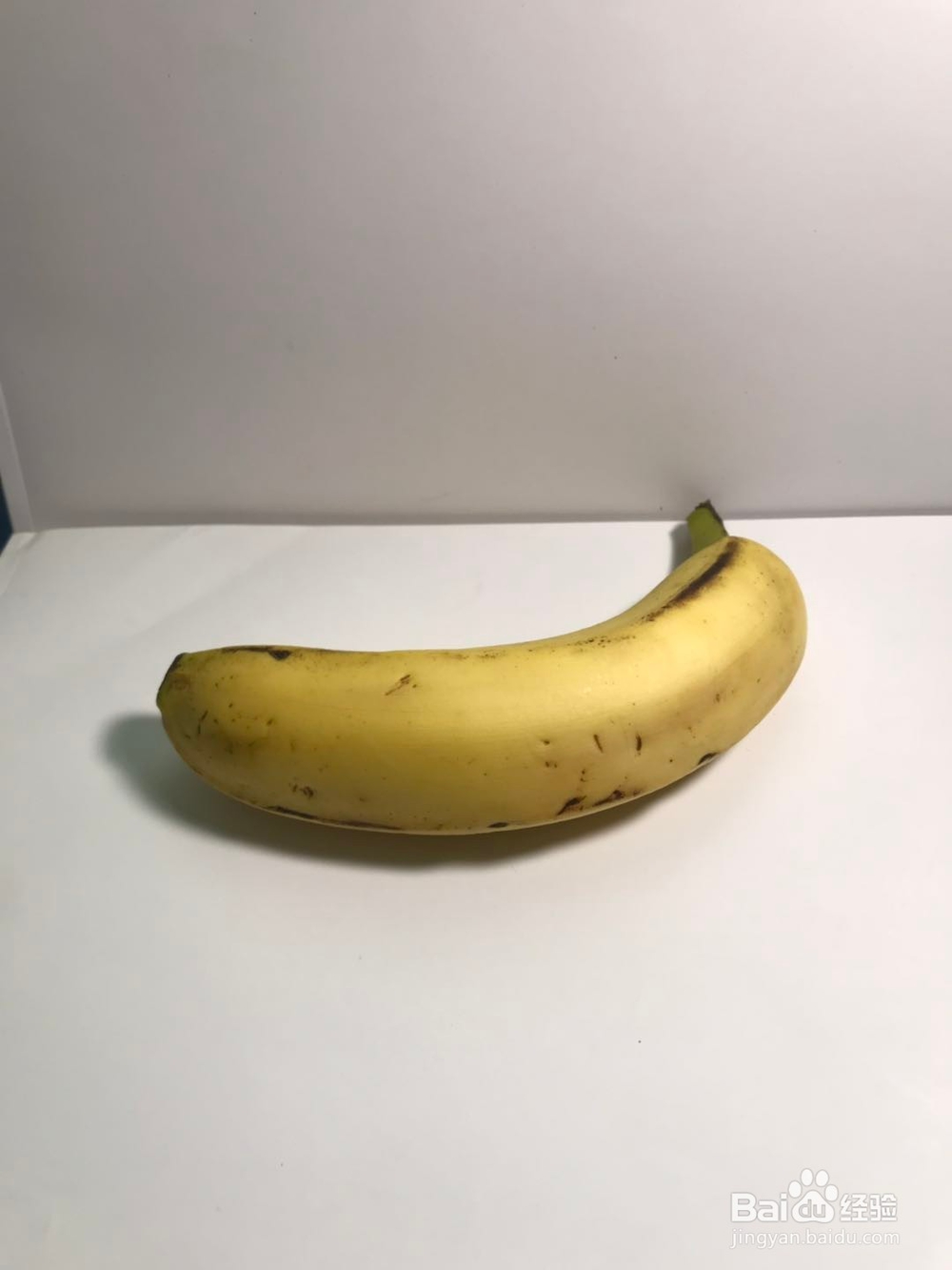 苹果手机怎么设置相机才能把人物拍白