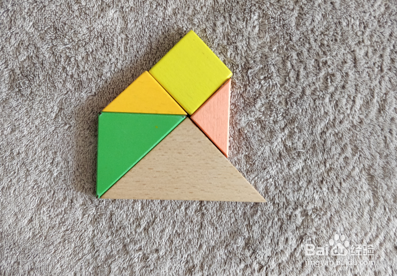 用七巧板怎样拼一个杏核？