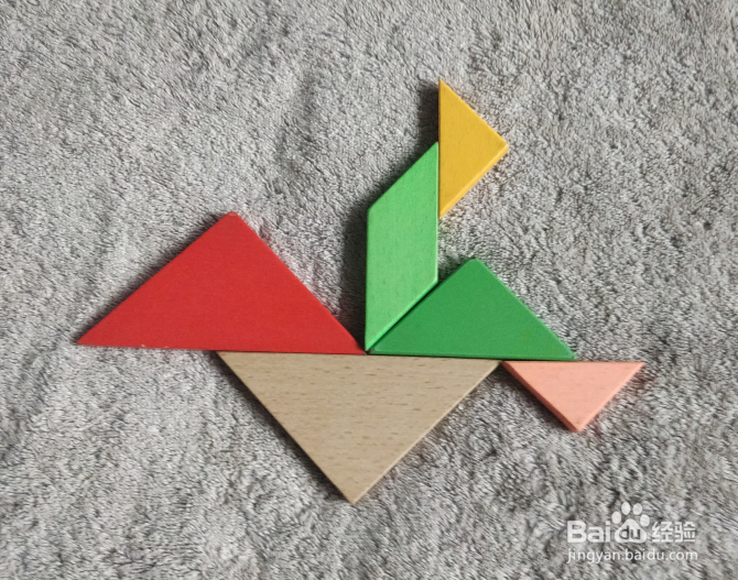 用七巧板怎样拼一个扮乌龟翻倒的幼儿呢?