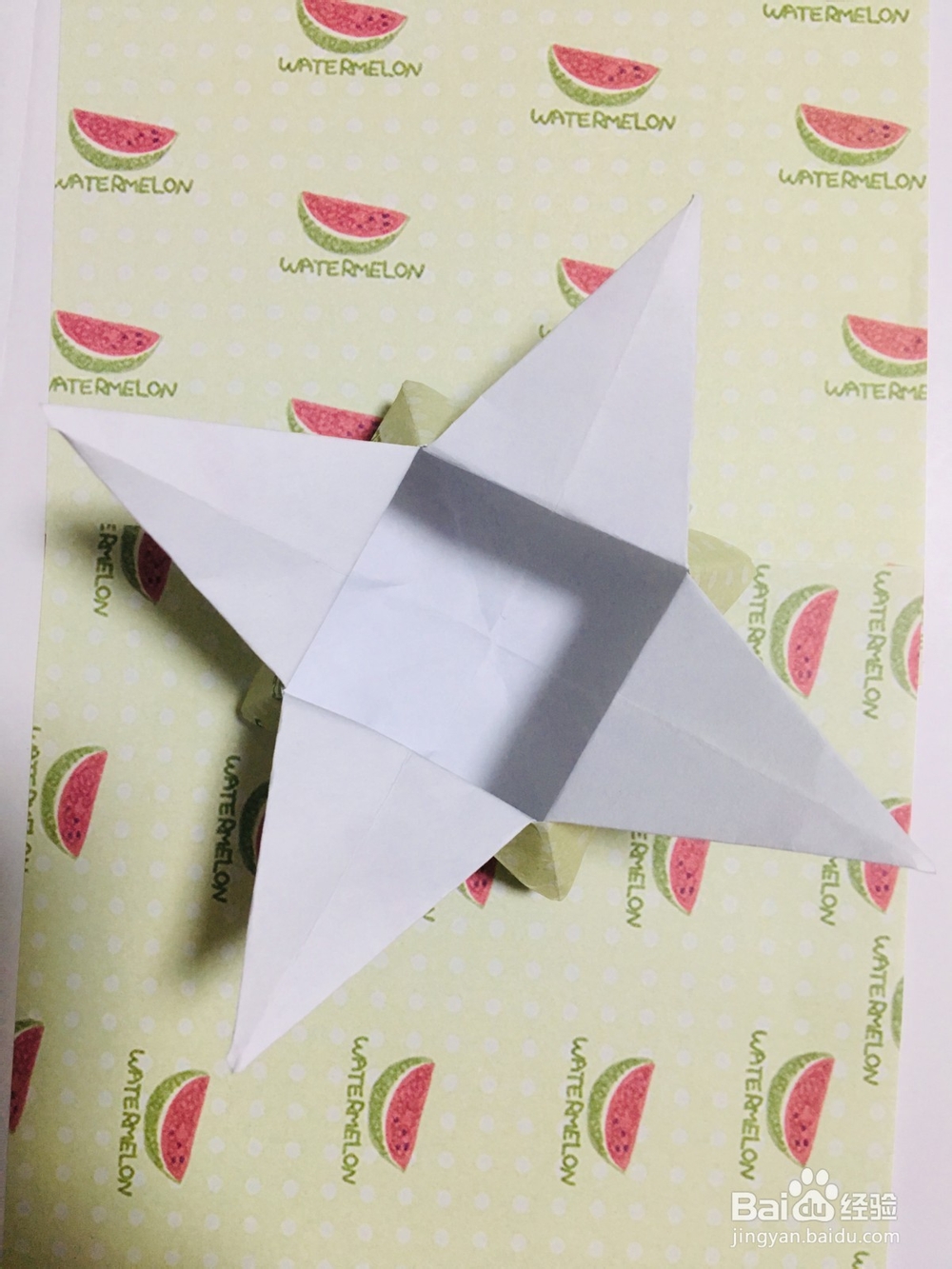 手工折纸：怎样用纸折一个四角星盒子？