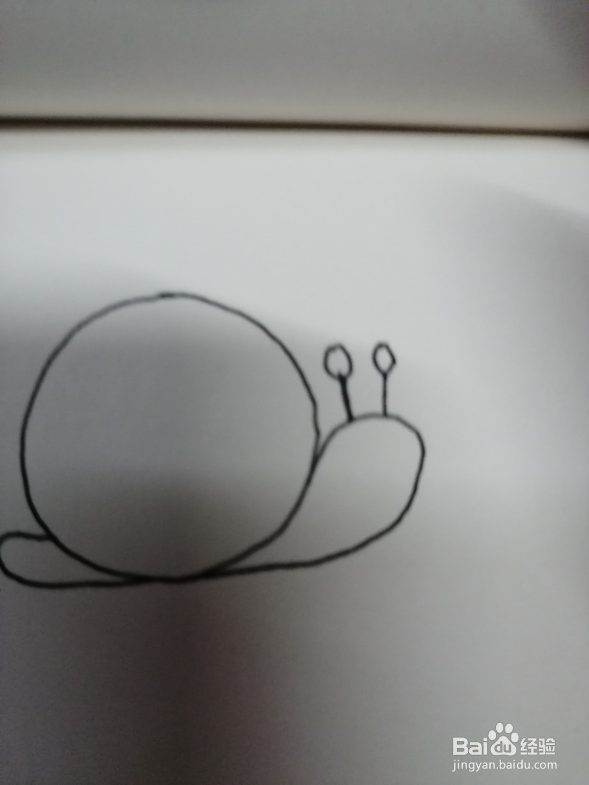 如何用圆形画出可爱的简笔画蜗牛？