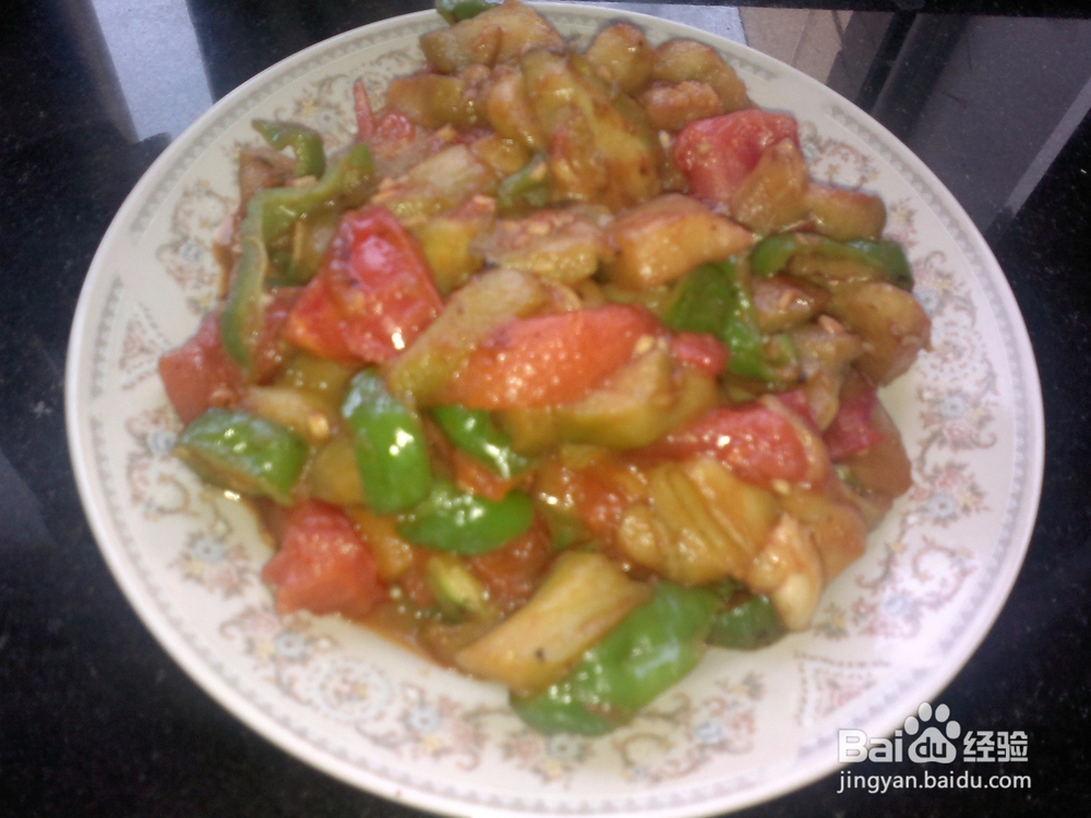 <b>好吃健康的青椒西红柿烧茄子的做法</b>