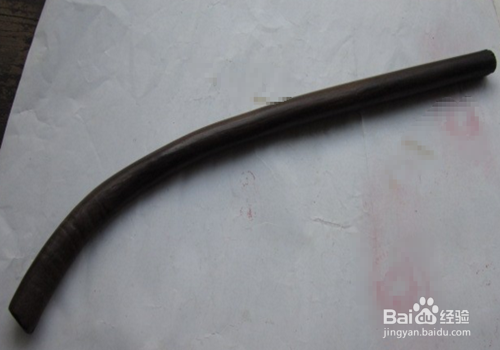 木棍湿弯怎样用火烤压直