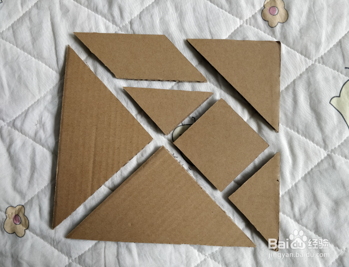 用七巧板怎么拼一个看书的学生呢