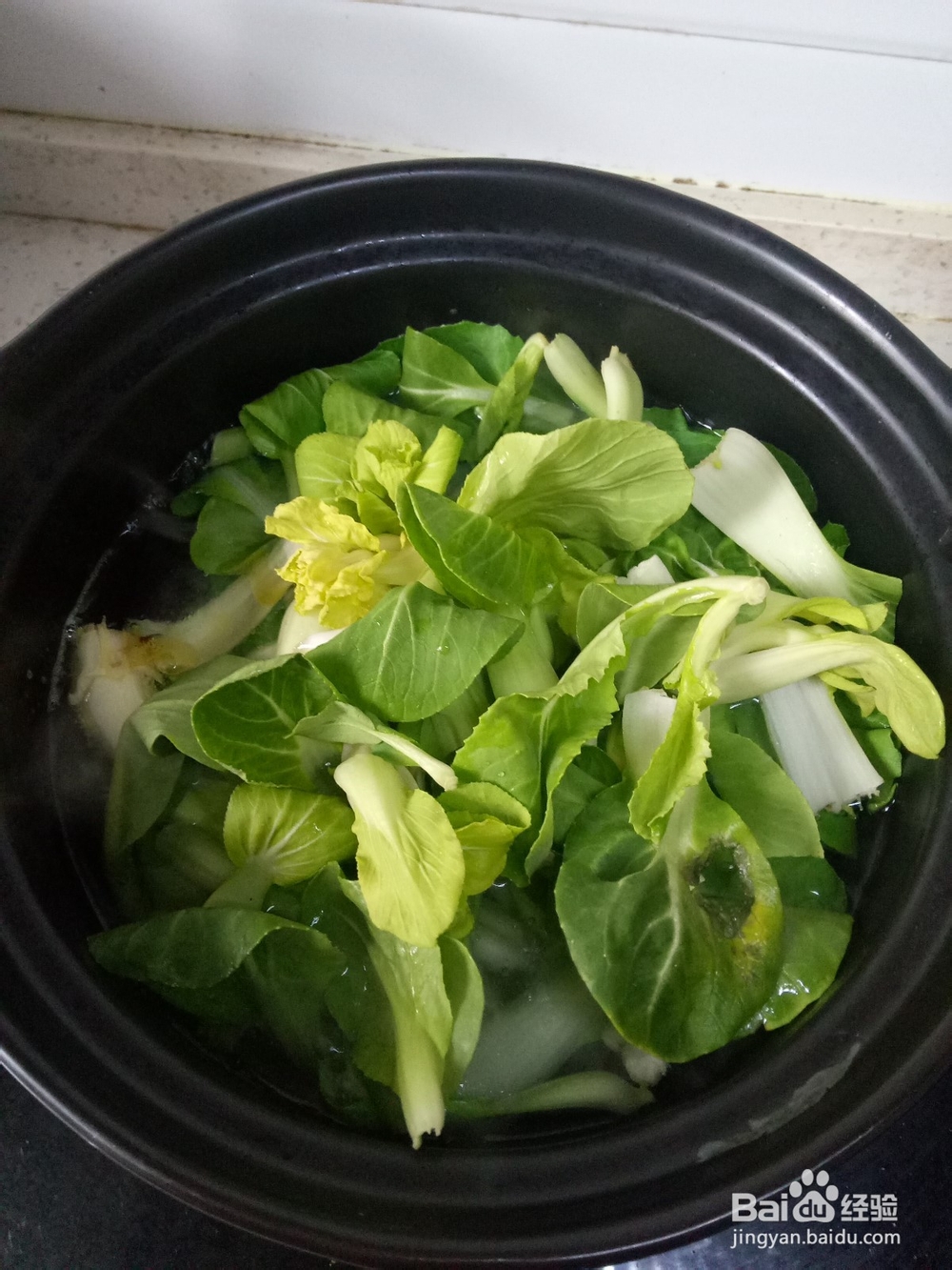 火锅丸子浇汁上海青