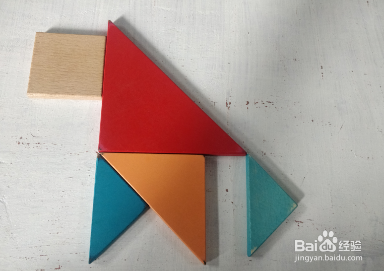 用七巧板怎样拼一只四脚挨地站着的猴子?